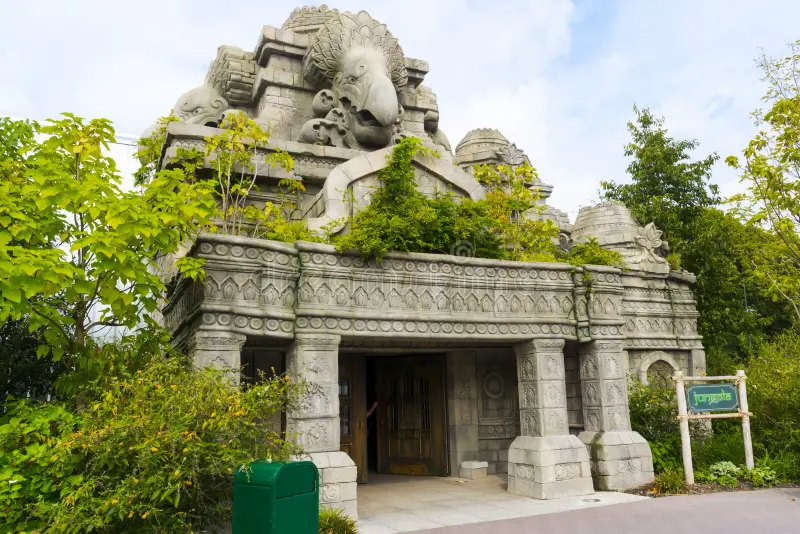 Wildwood Zoo main entrance with stone archway and lush gardens